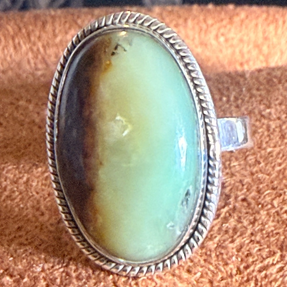 Beautiful shade of Green and Brown 
Sterling Silver .925